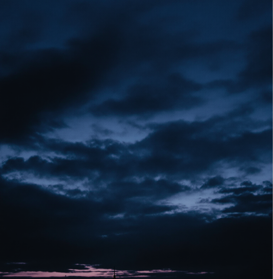 It's moments like these, staring at the Nashville skyline, where I question if I'm truly making a difference or just another cog in a broken machine. The purple hues feel mocking today.