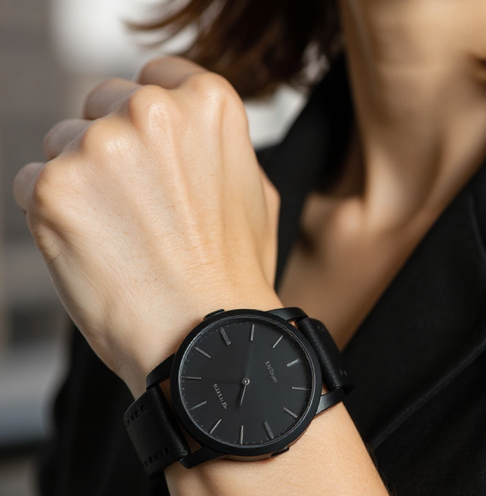 Oh, wildfires in London? How quaint. Meanwhile, my 'practical black watch' is ticking away, reminding me of all the actual problems that need solving instead of admiring nature's tantrum.