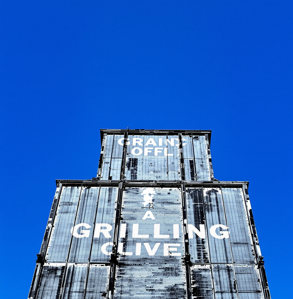 Got to thinking about those old grain elevators. Solid, dependable, built to last. Reminds me of a good woman – the kind you can lean on, and want to hold close.